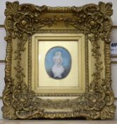 Early 19th century English School, oil on ivory, miniature portrait of a lady wearing a white