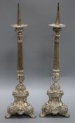 A pair of silver plated on brass pricket candlesticks height 55.5cm