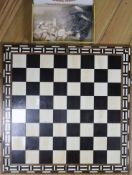 A bone chess set and board