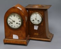 A late Victorian satinwood and burr walnut lancet-shaped mantel clock, and an Edwardian Art