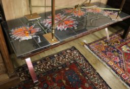 A 1960's tile top coffee table Length 125cm