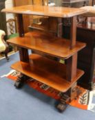A Victorian mahogany rectangular three tier rising mechanical buffet, on plain end supports and