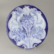 A Moorcroft Macintyre Florian ware circular dish, in blue daffodils design, green signature W.