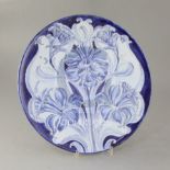 A Moorcroft Macintyre Florian ware circular dish, in blue daffodils design, green signature W.