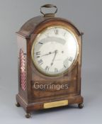 George Fowley of Doncaster. A Regency mahogany bracket clock, with arched cased and painted circular