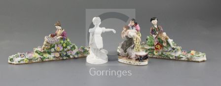 A group of Minton bone china figures, c.1825-45, comprising a pair of flower encrusted pen rests