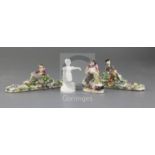 A group of Minton bone china figures, c.1825-45, comprising a pair of flower encrusted pen rests