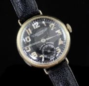 A 9ct gold-cased 'Land & Water' manual wind trench watch, retailed by Birch & Gaydon Ltd,