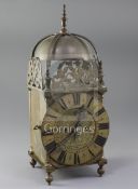 A late 19th century 17th century style brass lantern clock, with twin fusee movement, height 15in.