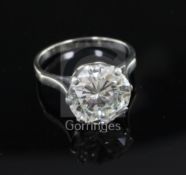 A platinum and round brilliant cut solitaire diamond ring, the stone weighing approximately 4.50cts,