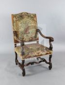 A Louis XIV style tapestry upholstered walnut fauteuil W.2ft 1in. H.3ft 9in.