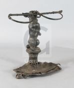 A Victorian Coalbrookdale? cast iron stick stand, modelled as a terrier holding a riding crop, width