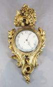 J Eckstrom of Stockholm. A Swedish carved giltwood cartel clock, with painted dial, the case