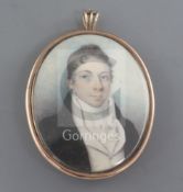 Early 19th century English Schooloil on ivoryMiniature portrait of a gentleman wearing a black