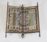 An Arts & Crafts stained glass panel screen H.53.5cm