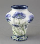 A Moorcroft Macintyre Florian ware pyriform vase, in blue poppies design, green signature W.