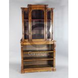 A Victorian burr walnut and marquetry cabinet on bookshelf, by Wilkinson & Son, with moulded