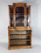 A Victorian burr walnut and marquetry cabinet on bookshelf, by Wilkinson & Son, with moulded