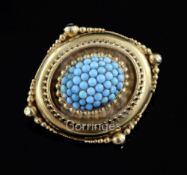 A Victorian gold and turquoise set oval pendant brooch with glazed back, with ropetwist and beaded