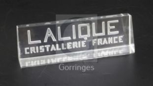 A Lalique inter-war period 'Cristallerie Lalique France' glass display label, 12.5cm