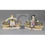 A pair of Minton figures with baskets, c.1840, on scrollwork bases, width 19.5cm, some restoration