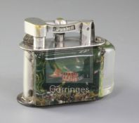 A Dunhill Aquarium lighter, with silver plated brass mounts, lacking one side panel width 3.5in.