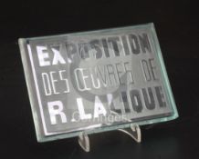 An inter-war period 'Exposition Des Oeuvres De R. Lalique' exhibition plaque, introduced in 1931, in