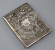 An early 20th century Chinese silver card case with embossed decoration and vacant cartouche, maker,