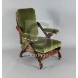 A Victorian Reformed Gothic walnut and marquetry 'Reclining Chair', designed by Charles Bevan, c.