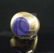 A heavy high carat gold and lapis lazuli set ring, the shank bearing the inscription "Cartier