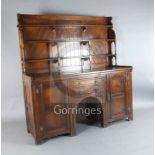 A Victorian Gothic revival 'red walnut' sideboard, in the manner of Charles Locke Eastlake,