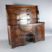 A Victorian Gothic revival 'red walnut' sideboard, in the manner of Charles Locke Eastlake,