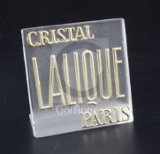 A Lalique frosted glass 'Crystal Lalique' display label with raised gilt lettering, 10 x 10cm.