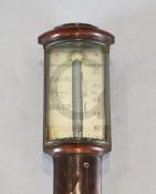 Dollond of London. A Regency mahogany bowfront stick barometer, with signed silvered scale and