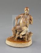 A Doulton Lambeth salt glazed stoneware figure of a seated gentleman, by George Tinworth, incised