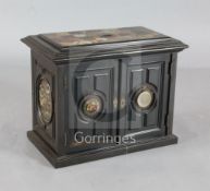 A 19th century Scottish ebony and hardstone table cabinet, the top inset with a patchwork panel of