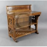 A Holland and Sons Gothic revival oak buffet or serving table, probably designed by Bruce Talbert,