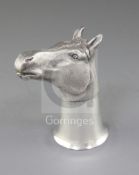 A 1970's textured silver stirrup cup, modelled as a horse's head, by Ralph H. Tugwood, with gilded