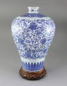 A large Chinese blue and white meiping, painted with lotus flowers and scrolling foliage in