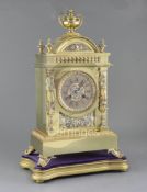 A 19th century French gilt and silvered mantel clock of architectural form with unsigned movement