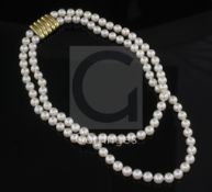A bespoke Cartier two-row cultured pearl choker necklace with 18ct gold clasp, signed Cartier,