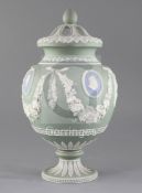 A Victorian two colour jasper pot pourri vase and cover, possibly Adams, decorated with relief