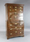 A George II walnut chest on chest, fitted three short, three graduated drawers over a slide and