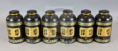A set of six 19th century Toleware tea canisters, each numbered and decorated with Chinese