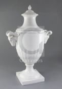 A large Furstenberg white glazed urn and cover, late 19th/early 20th century, of neo-classical form,