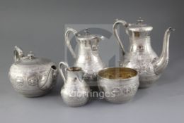 A good Victorian five piece silver tea and coffee service by Frederick Elkington, with engraved