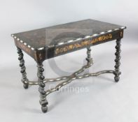 A mid 19th century Dutch marquetry, ebony and bone centre table, the rectangular top inlaid with