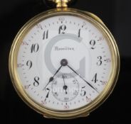 A George V 18ct gold Hamilton open face keyless lever pocket watch and an 9ct gold curblink albert,