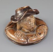 A rare Doulton Lambert stoneware 'SAVED' match holder, c.1890, modelled with the head of a man