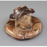 A rare Doulton Lambert stoneware 'SAVED' match holder, c.1890, modelled with the head of a man